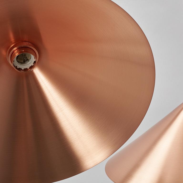 A pair of Frama Shade 360 ceiling lamps.