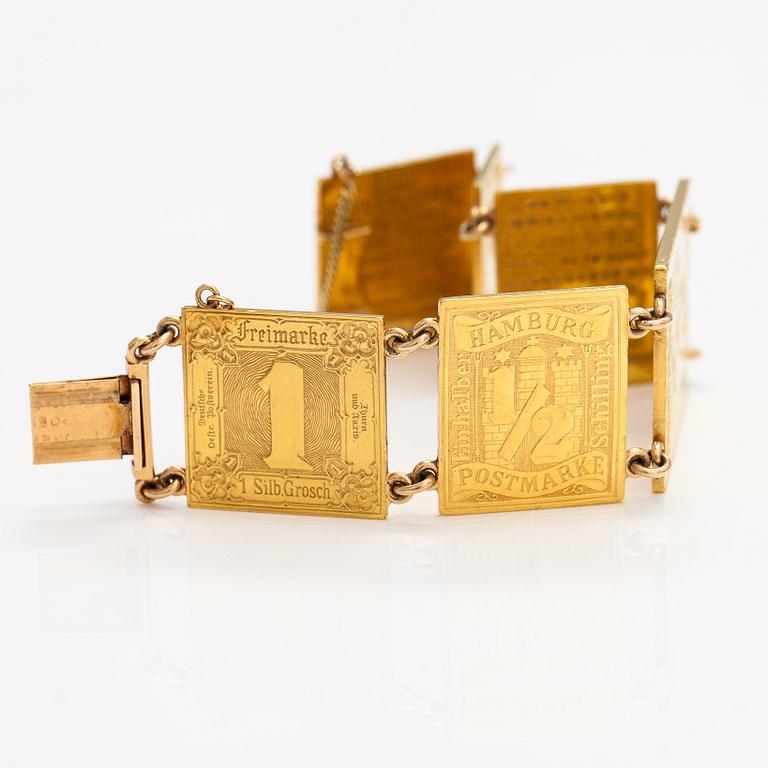 A bracelet with post stamps made of 900 gold..