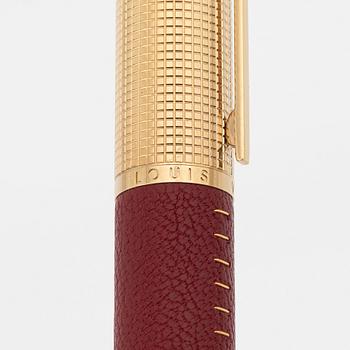 Louis Vuitton, a red leather and gold plated 'Doc Cuir' rollerball pen.