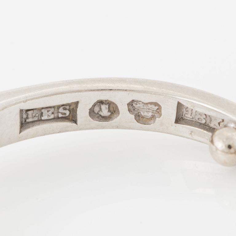 Ring, enstensring, 18K vitguld med briljantslipad diamant.