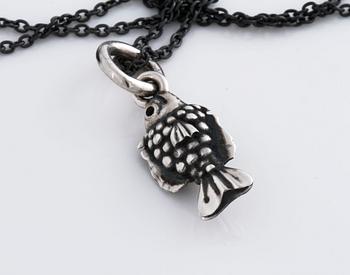 A pendant, "My friend" by Ole Lynggaard.