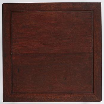 A Chinese hardwood corner-leg table, Qing dynasty.