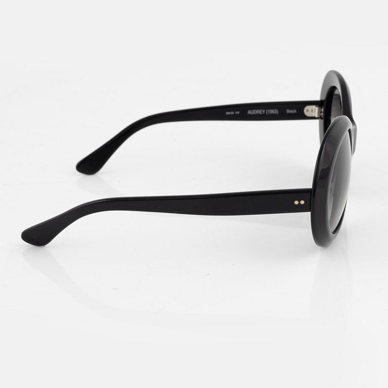 Oliver Goldsmith, a pair of black "Audrey" sunglasses.