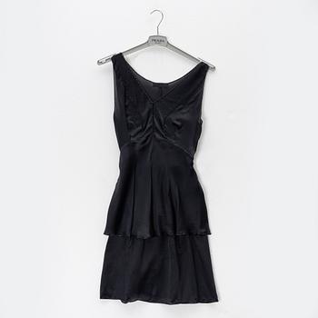 Prada, a set of a black silk top and skirt, size 42.