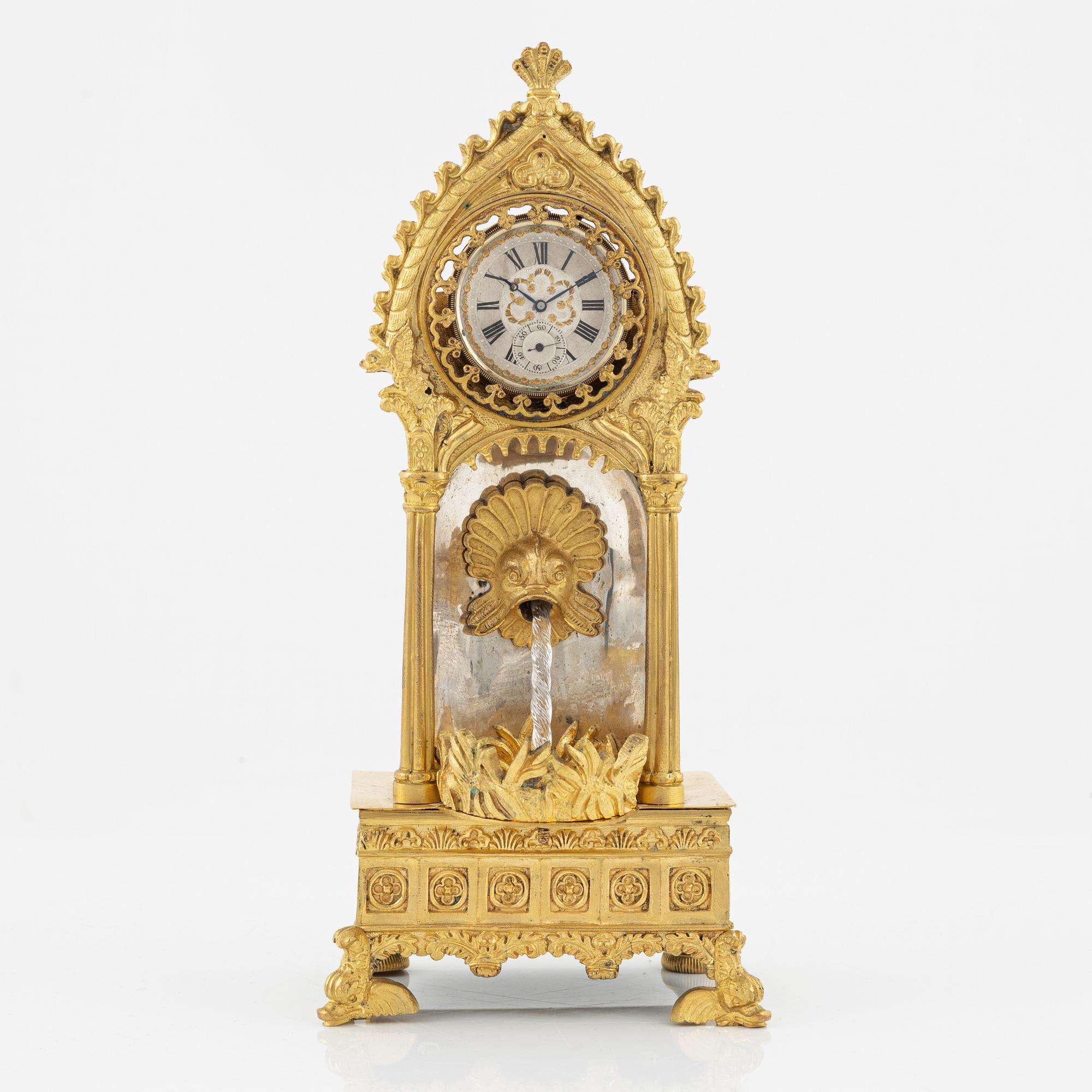 Fickursställ, 1800-talets mitt, samt fickur Paul Jeannot/C Robert.