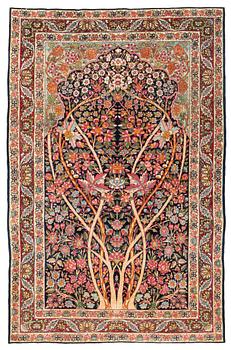 An antique Kerman, so called 'Millefleurs tree-of-life' rug, southeast Persia, c. 211 x 138 cm.