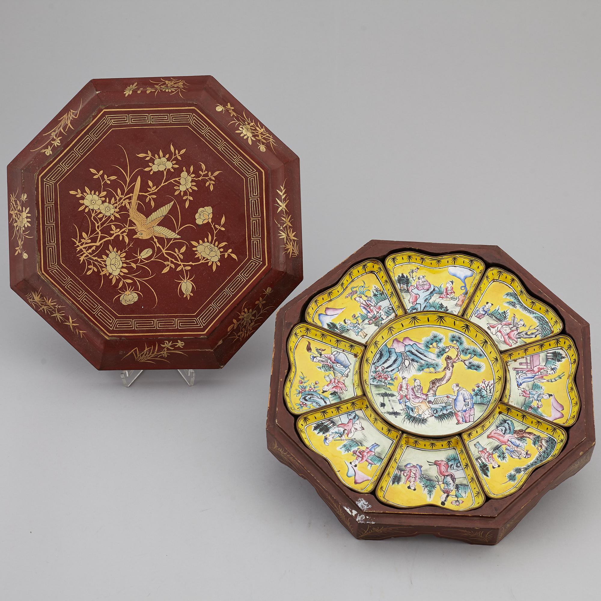 A nine piece enamel on coppar  cabaret in a wooden box, Qing dynasty.