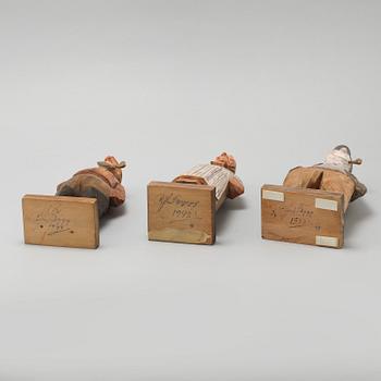 and CARL JOHAN TRYGG, three wooden sculptures, signed and dated, 1940s.