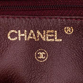 CHANEL, a beigebrown leather shoulder bag.