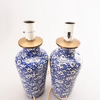 A pair of 20th century porcelain  table lamps.