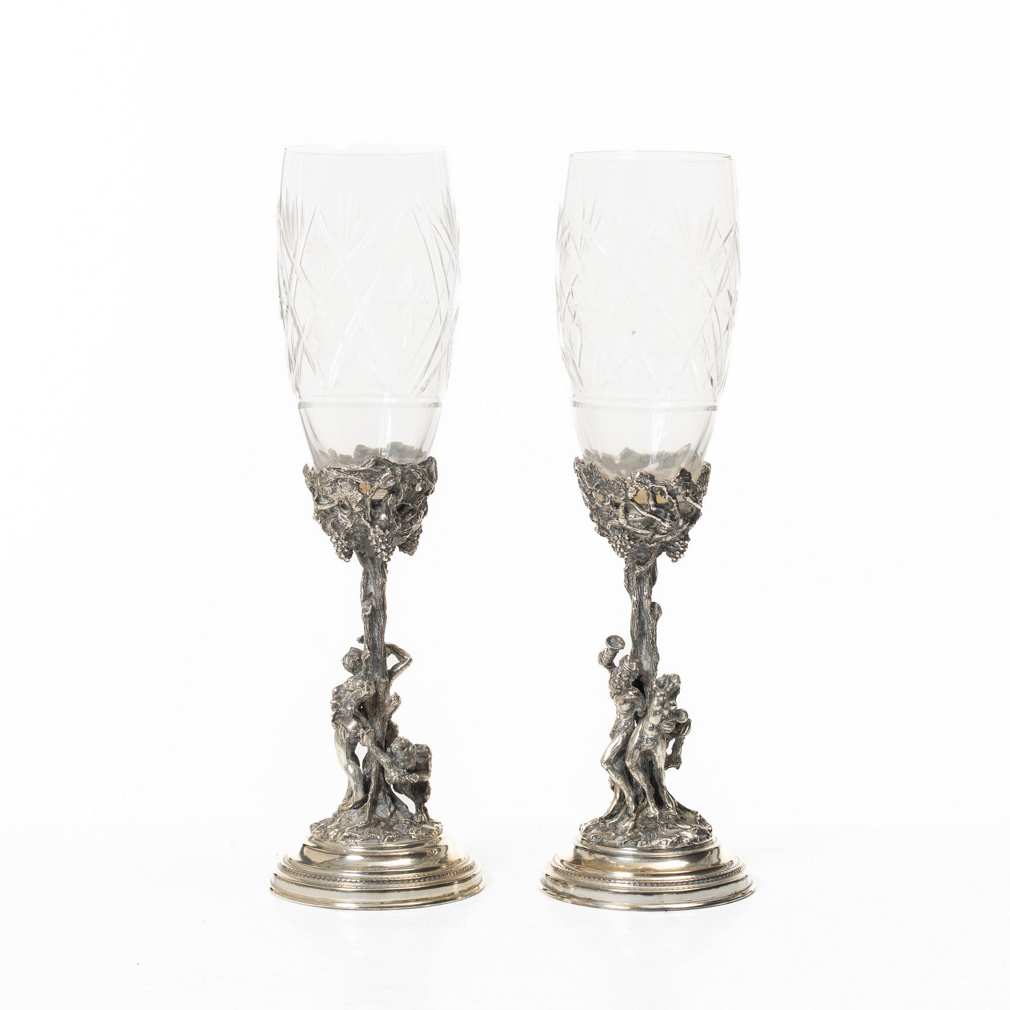 Champagne glasses, a pair, silver and glass, 20th century.