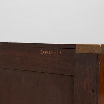 A chest of drawers, England, second half of the 20th century.