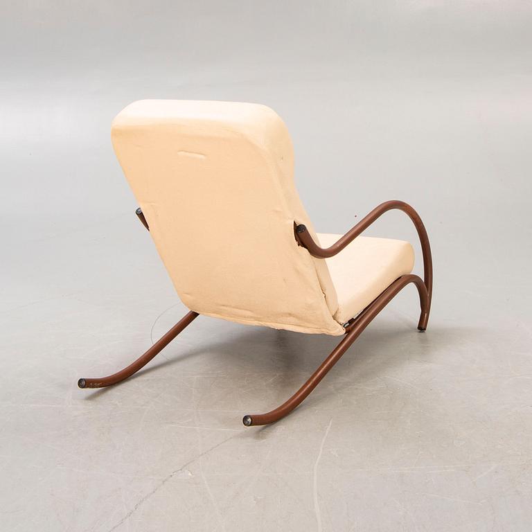 A 1930/40s metal and textile/plastic easy chair.