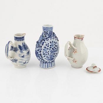 A blue and white moon flask and two creamers, porcelain, China, 18th-19th century.