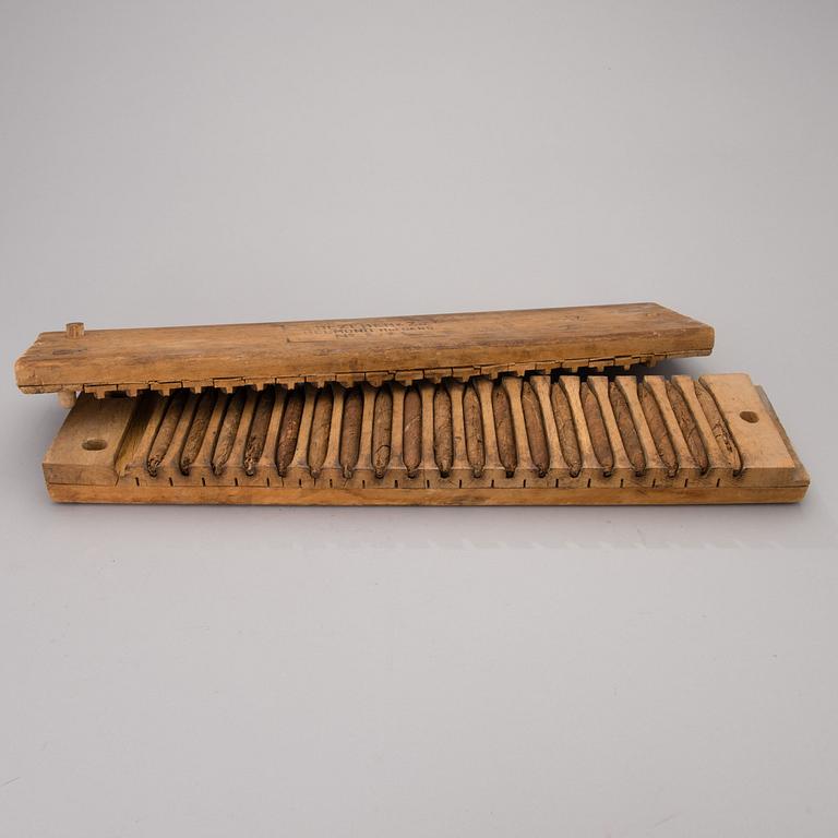 A CIGAR FORM, wood, first half of the 20th century.