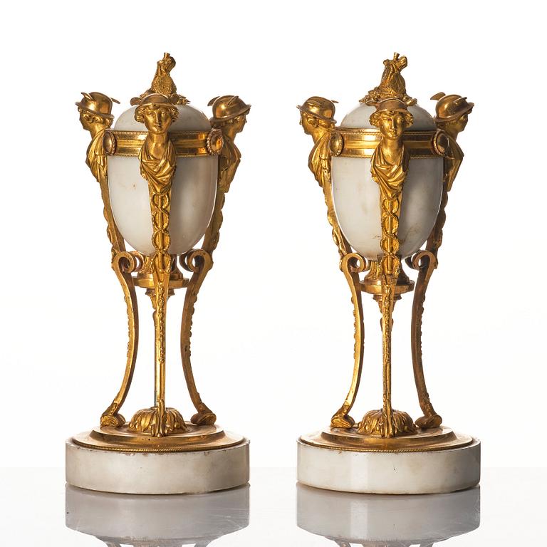 A pair of Louis XVI Cassolettes, white marble and gilt-bronze, around 1790.