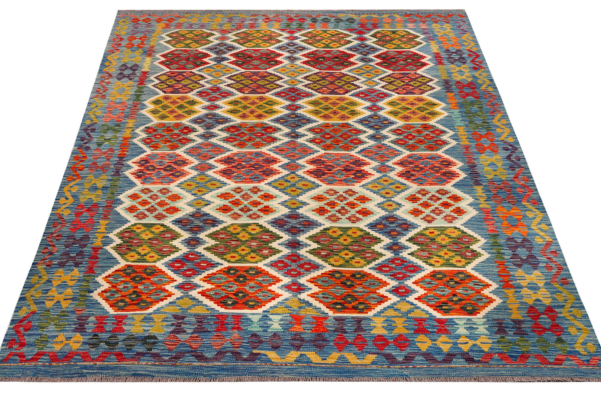 An Afghan Kilim carpet, c. 297 x 206 cm.