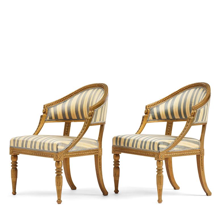 A pair of late Gustavian open armchairs attributed to E. Ståhl (master in Stockholm 1794-1820).