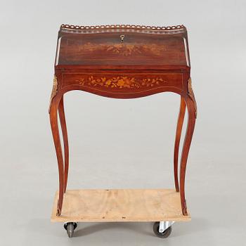 A Louis XV-style writers desk from the mid 20th century.