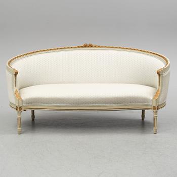 A sofa, four chairs and a table, gustavian style, early 20th century.