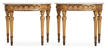 A pair of Louis XVI late 18th century console tables.