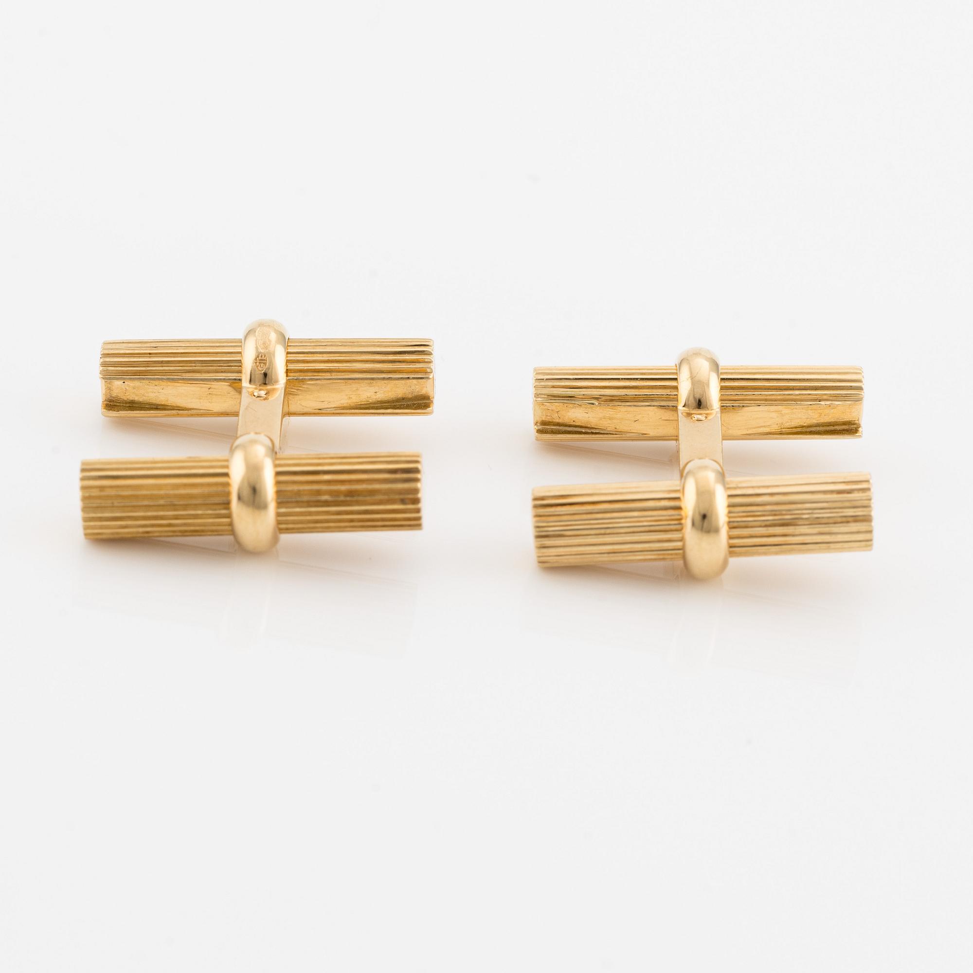 Van Cleef & Arpels, cufflinks with interchangeable parts in 18K gold and stone.