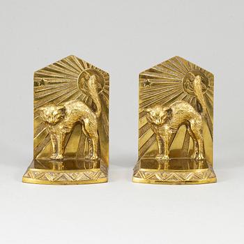 A pair of art déco bronze book ends, 1930s.