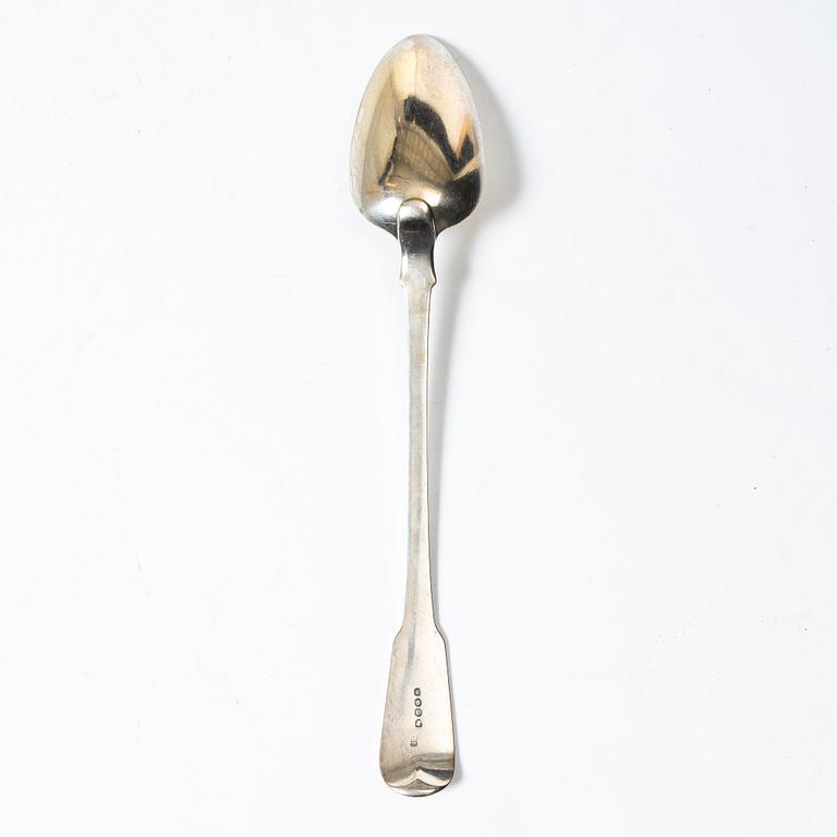 An English silver serving spoon, London 1815.