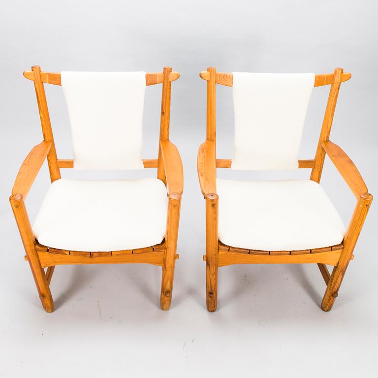 LASSE OLLINKARI, a pair of 1948 open armchairs.