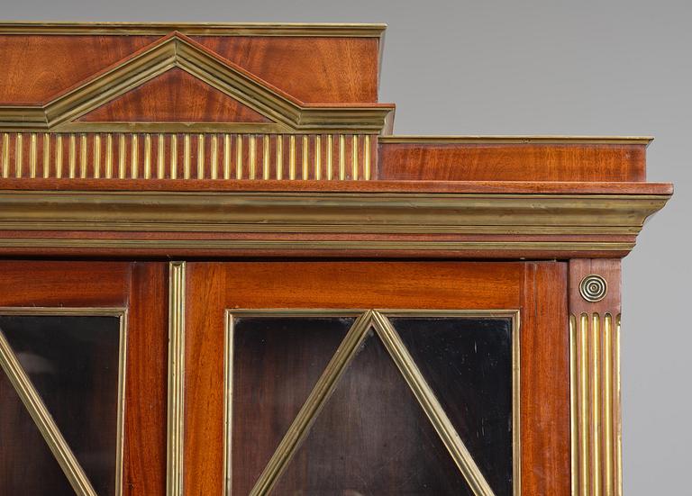 A pair of Russian mahogany and brass-mounted Jacob-style bibliothèques, modern with old parts.