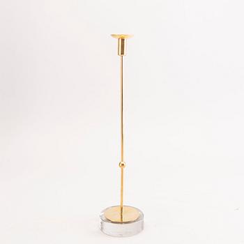 Gunnar Ander, a set of five different brass and glass candle sticks from Ystad Metall mid 1900s/second part.
