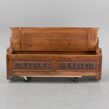 A painted Swedish wooden sofa, dated 1845.