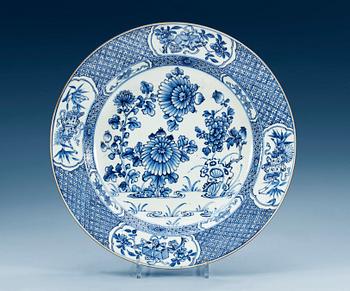 1523. A blue and white charger, Qing dynasty, Qianlong (1736-95).