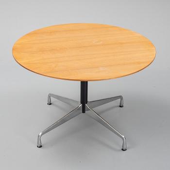 Charles & Ray Eames, a"Segmented Round Dining Table" from Vitra.