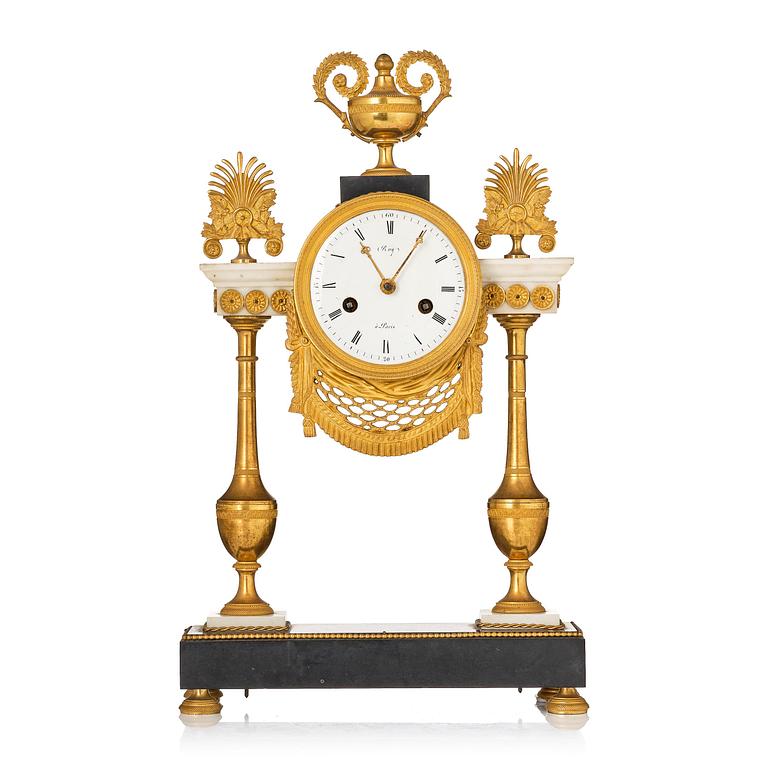 A late Louis XVI ormolu and marble portico clock, Paris, latge 18th century.