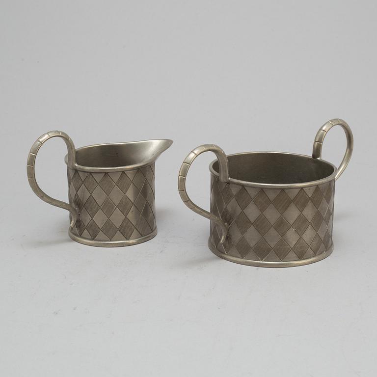 FIRMA SVENSKT TENN, a pewter sugarbowl and creamer Model nr 170, Stockholm 1927.