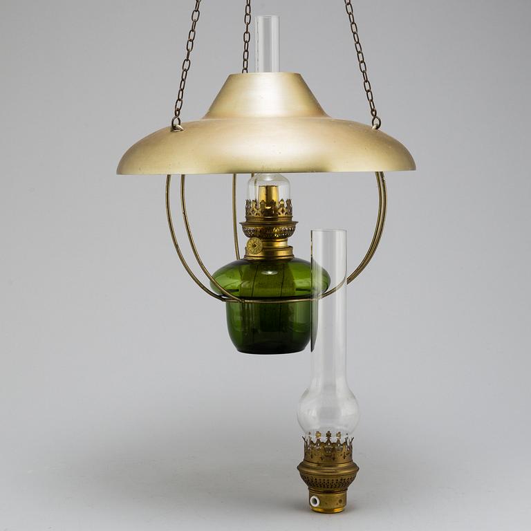 a paraffin ceiling light, brass and glass.