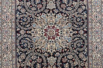 A carpet, Nain, part silk, 9 Laa, ca 295 x 197 cm.