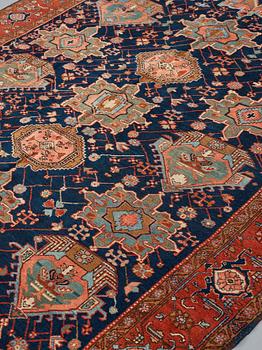 A CARPET, a semi-antique Heriz, 335,5-337,5 x 237-240 cm.