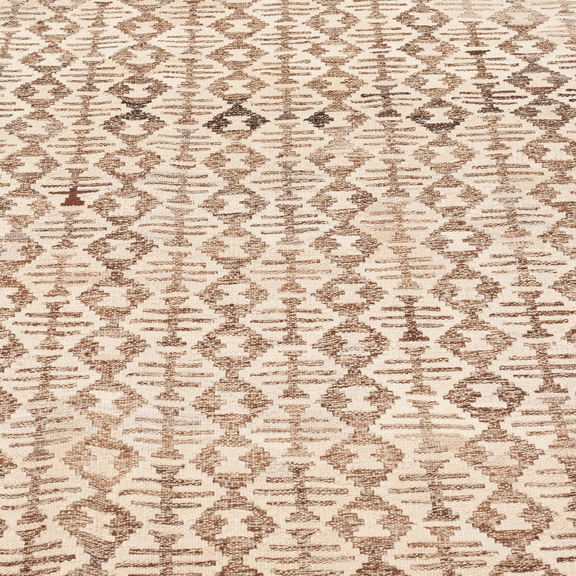 An oriental Kilim, ca 345 x 260 cm.