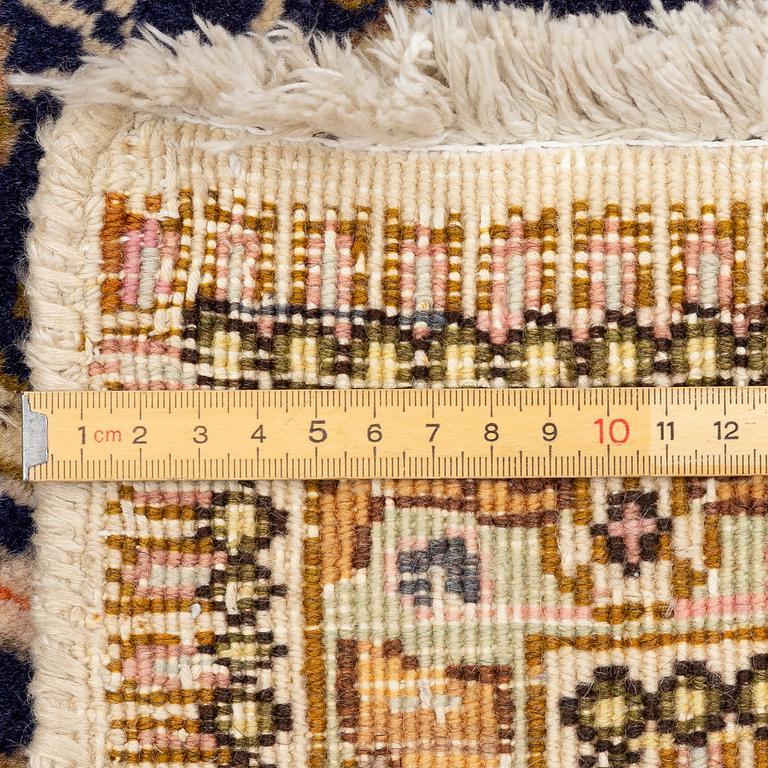 Rug, Tabatabaei/Tabriz, semi-antique, approximately 361 x 288 cm.
