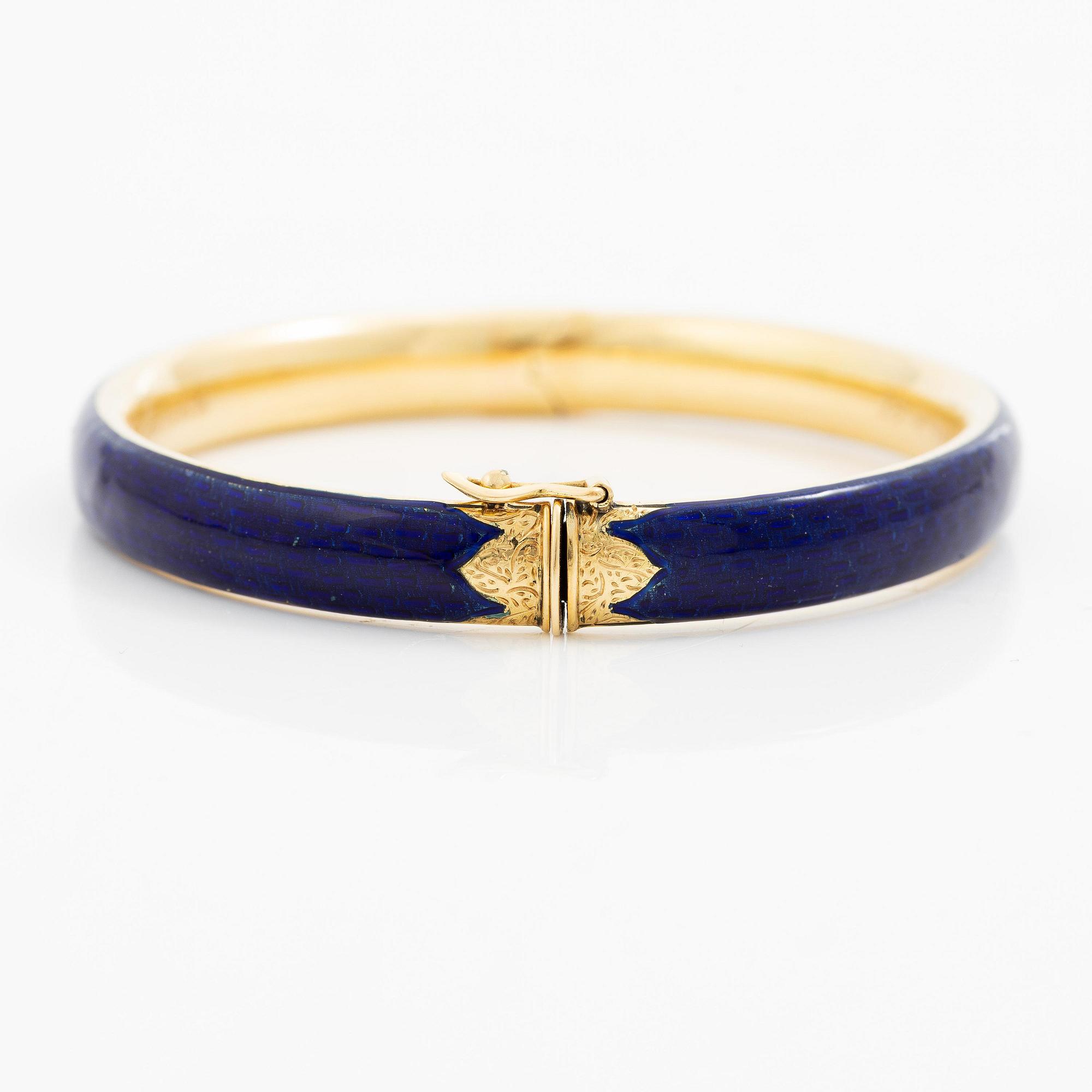 A bracelet 18K gold and enamel.