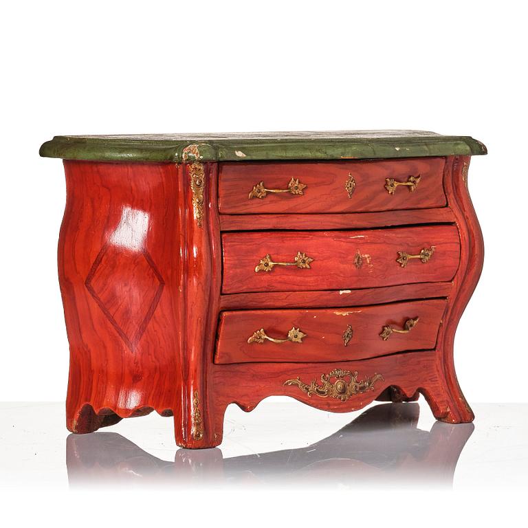 A painted miniature Rococo commode, later part of the 18th century.