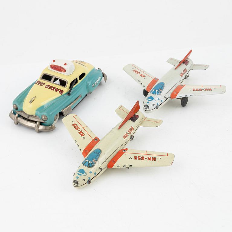 A set of eleven tin toys, Germany and Japan, 20th Century.