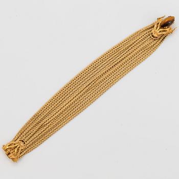 Armband 18K guld med kvarts-kattöga.