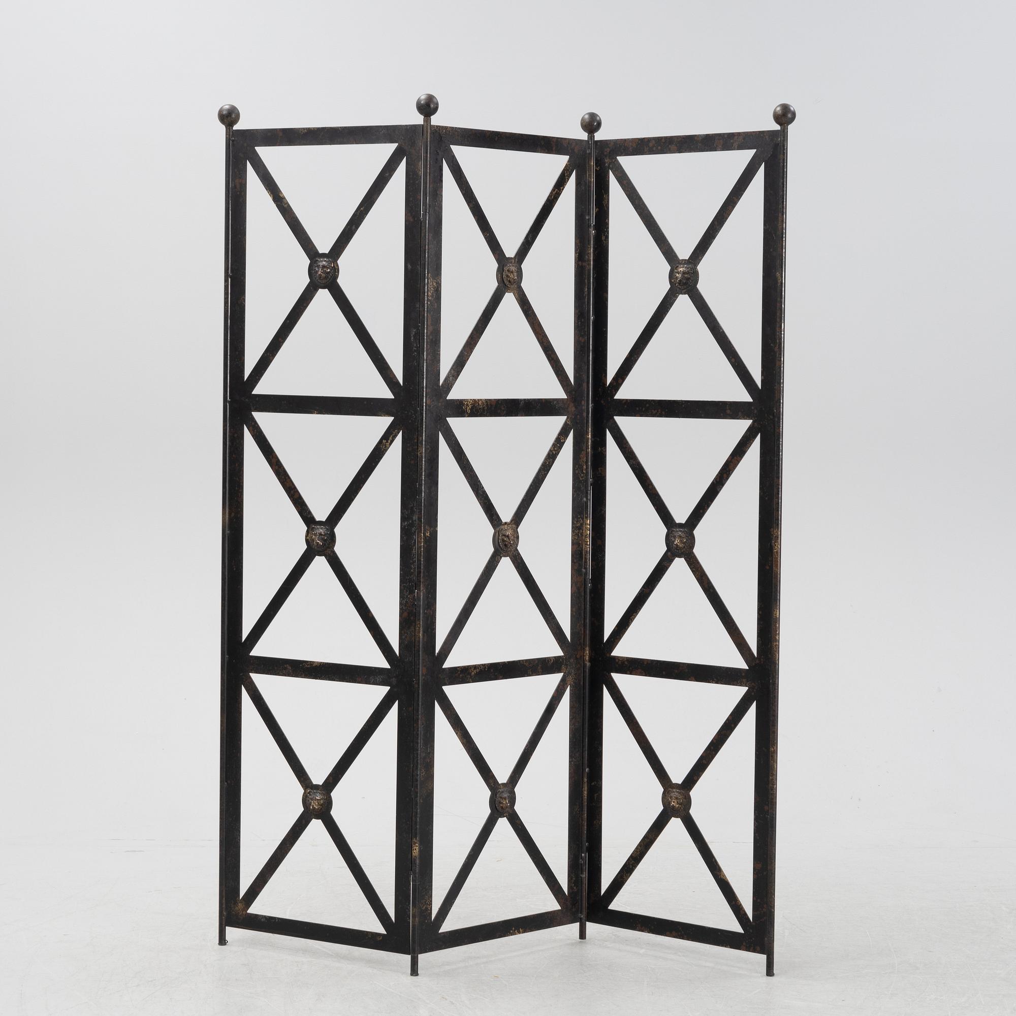 An contemporary open iron folding screen.