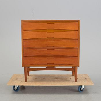 A mid 20th century teak dressing commode.