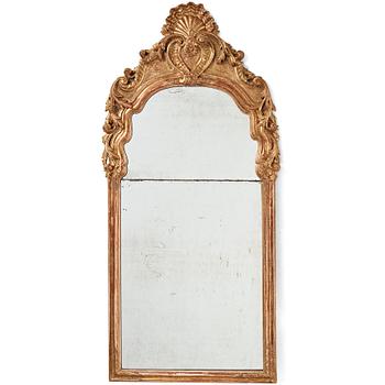 79. A German late Baroque mirror, first half of the 18th century.