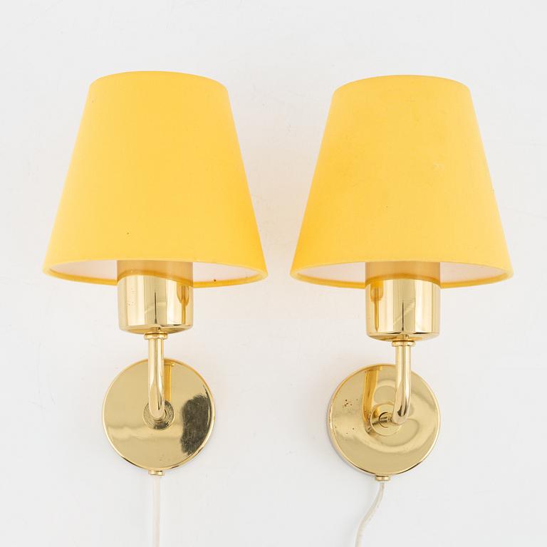 Josef Frank, a pair of model 2143 brass wall lights, Firma Svenskt Tenn, Sweden.