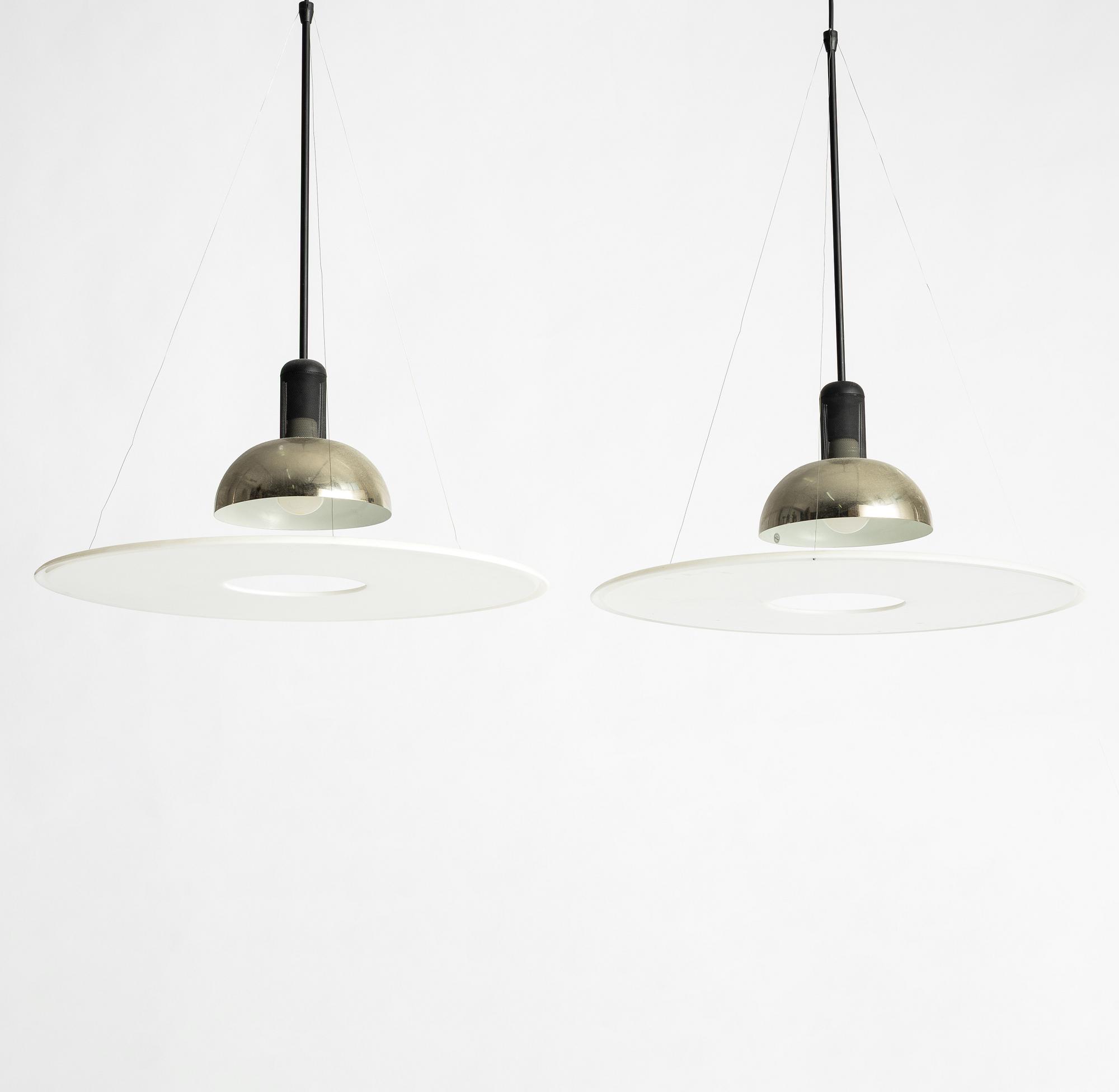 Achille Castiglioni, a pair of "Frisbi" ceiling lights, Flos, Italy.